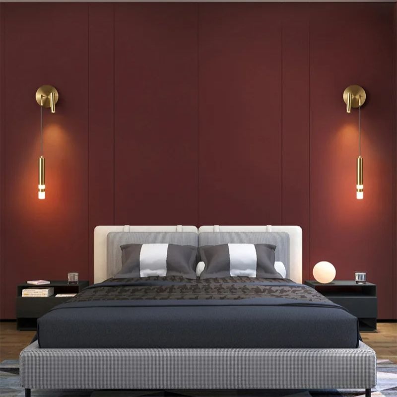 Applique murale dorée design et orientable pour chambre ou salon