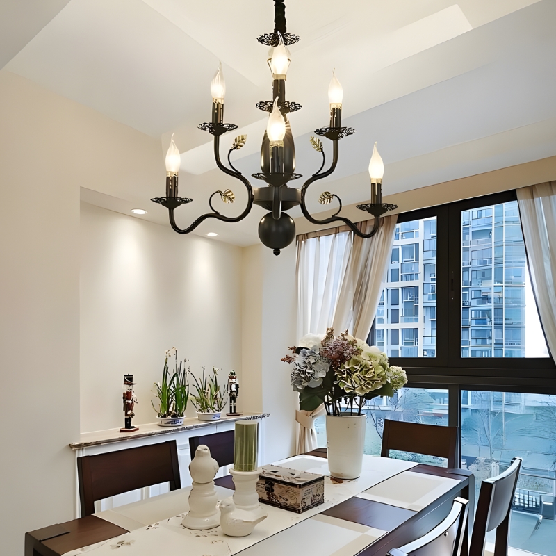 Lustre baroque doré et noir en fer forgé